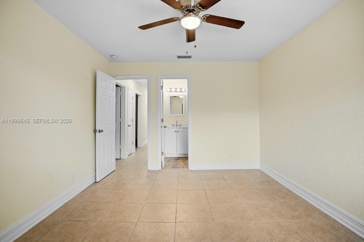 7604 Southwest 10th Court, Unit 2 Pompano Beach, FL 33068 - Photo 10 of 19 a view of an empty room