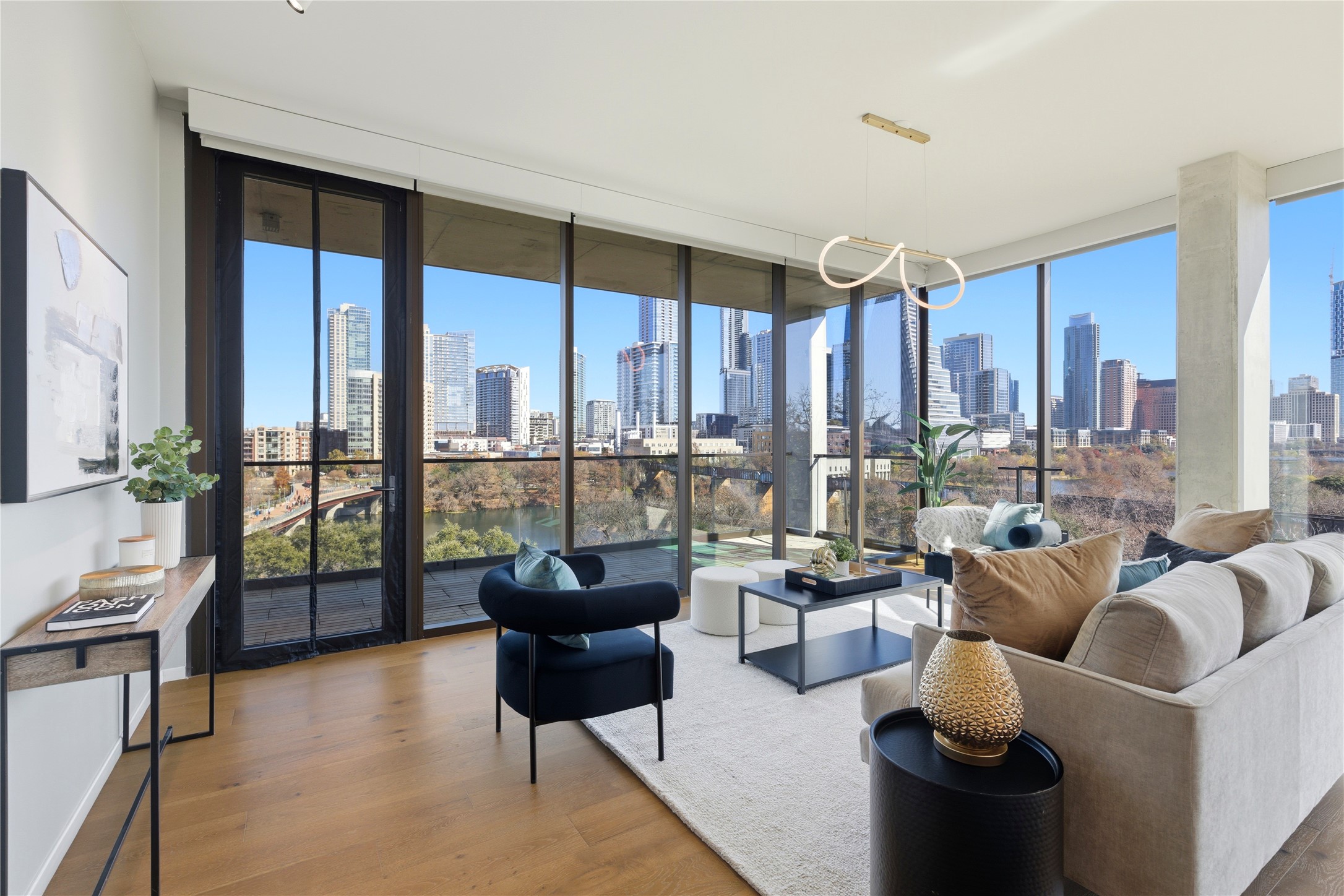 1211 West Riverside Drive, Unit 6B Austin, TX 78704 - Photo 1 of 40 a living room with furniture and a large window