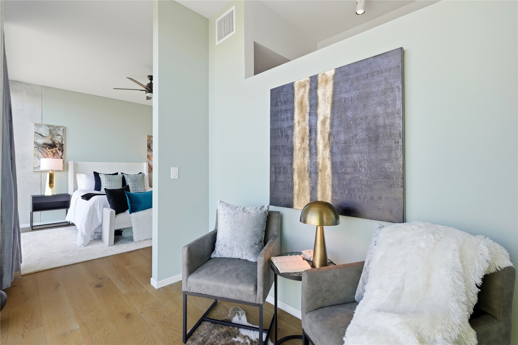 1211 West Riverside Drive, Unit 6B Austin, TX 78704 - Photo 15 of 40 a bedroom with a bed and wooden floor