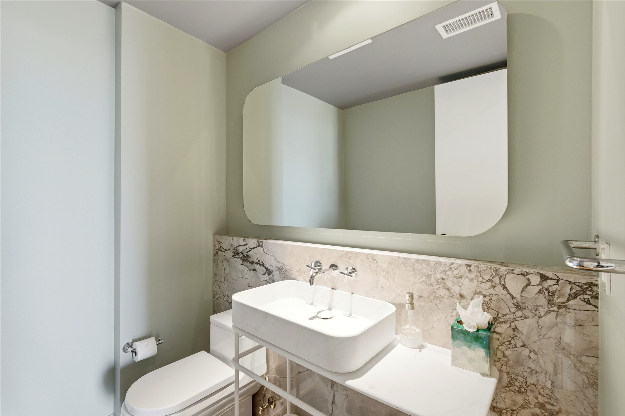 1211 West Riverside Drive, Unit 6B Austin, TX 78704 - Photo 24 of 40 a bathroom with a sink and a mirror