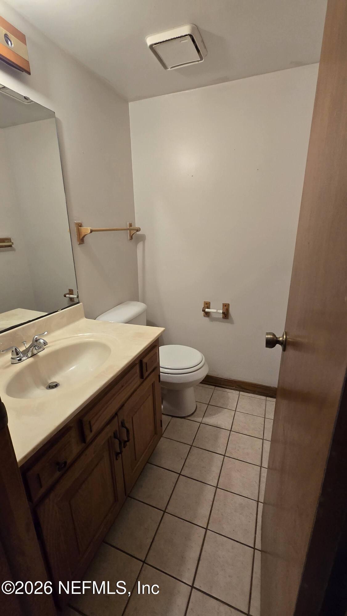 8532 Bandera Circle East Jacksonville, FL 32244 - Photo 42 of 47 a bathroom with a sink and a toilet