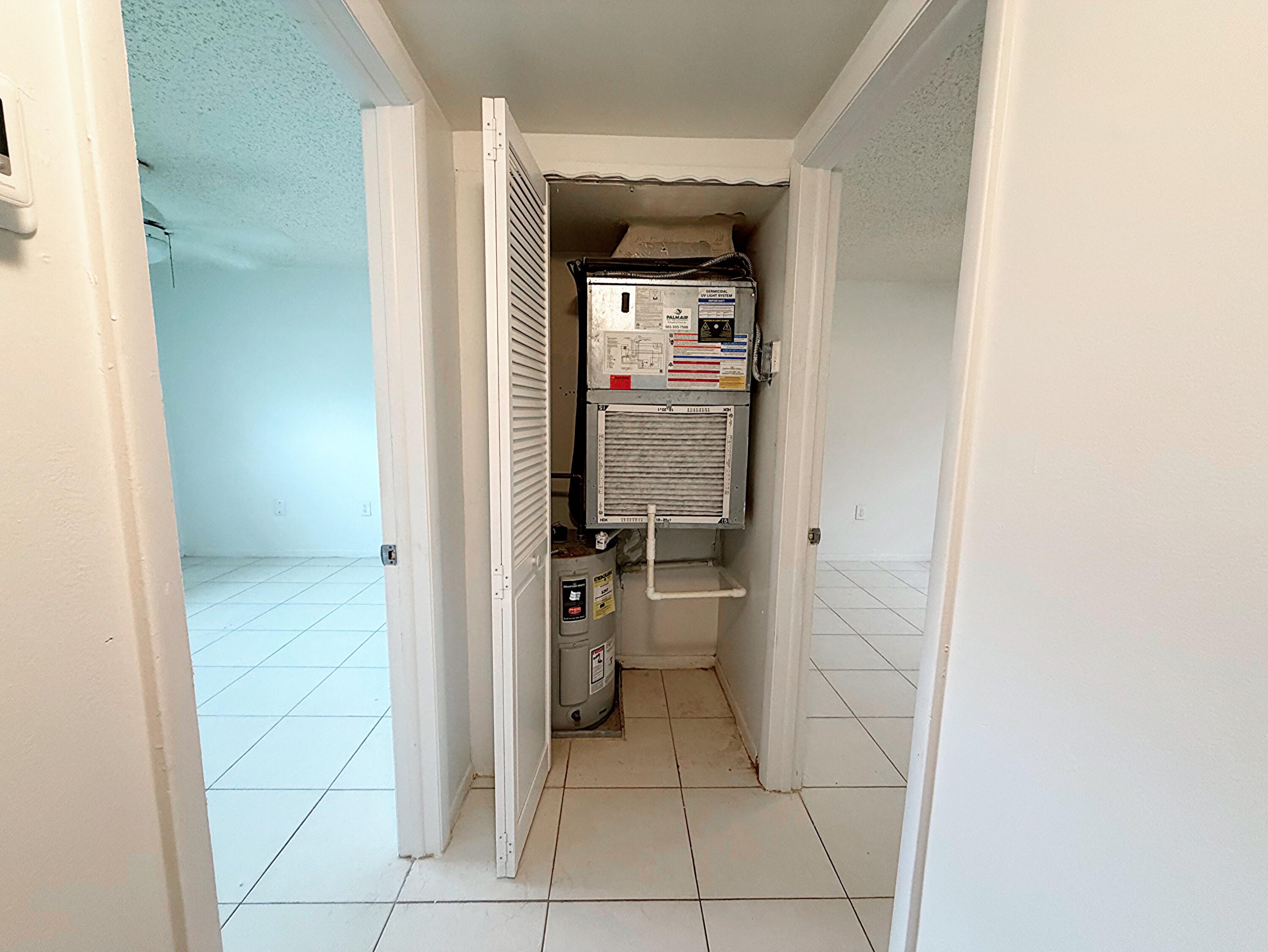 650 Southwest 2nd Avenue, Unit 2480 Boca Raton, FL 33432 - Photo 21 of 26 AC unit & water heater