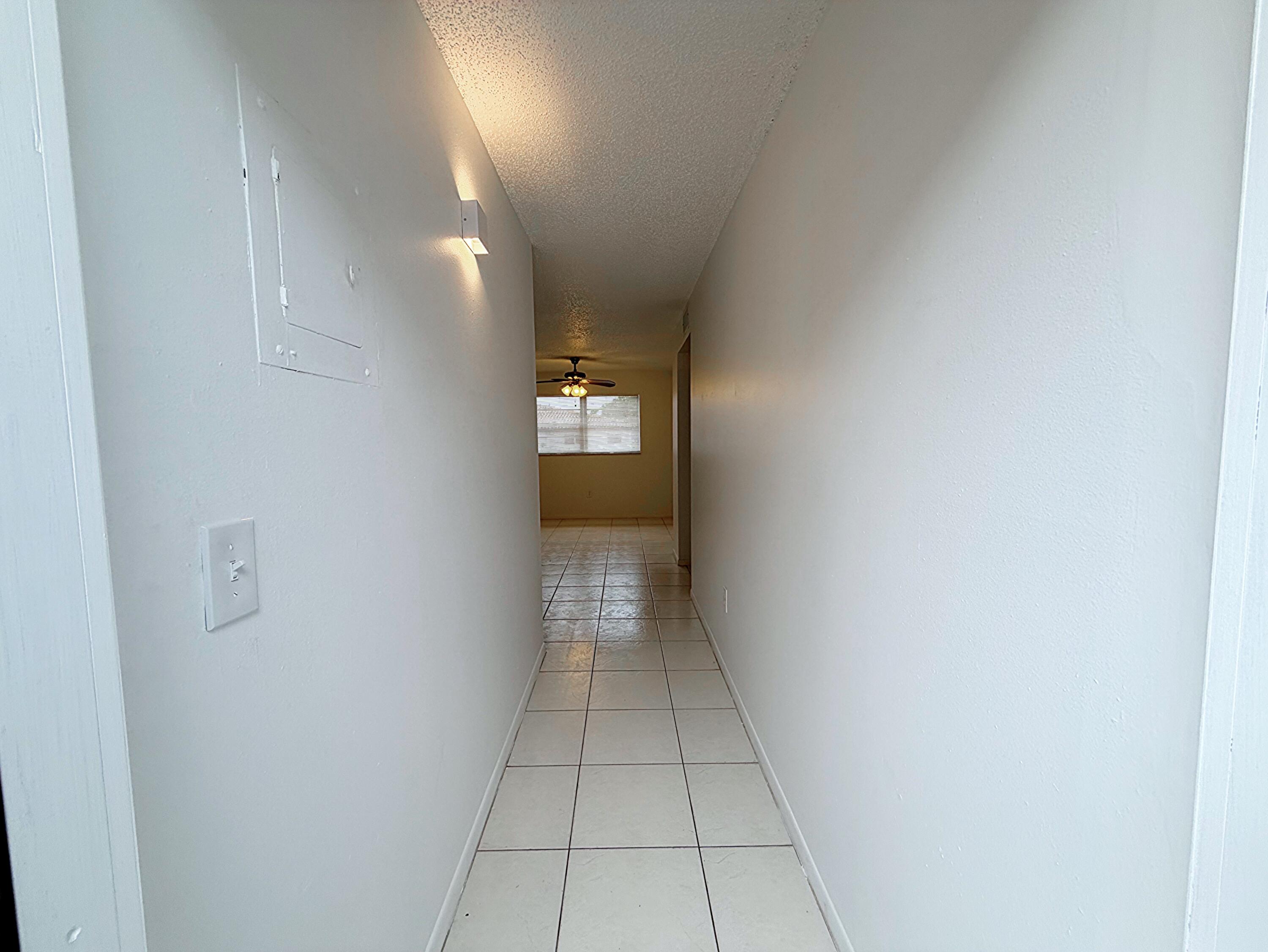 650 Southwest 2nd Avenue, Unit 2480 Boca Raton, FL 33432 - Photo 3 of 26 Hallway: Entrance