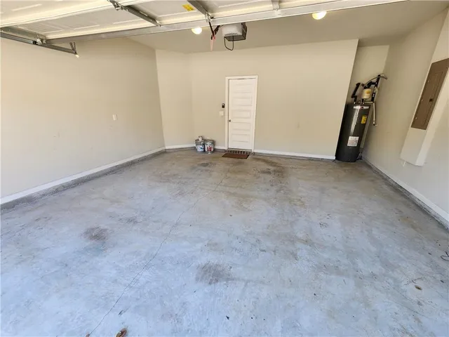 a view of house with swimming pool outdoor seating