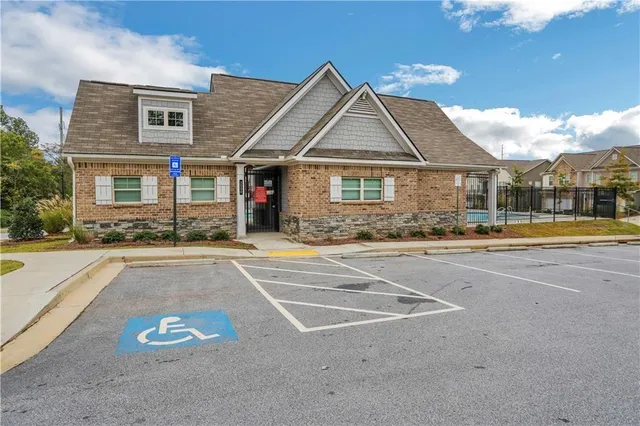 a view of a park with swings and slides