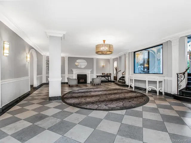 a view of a livingroom with furniture and window