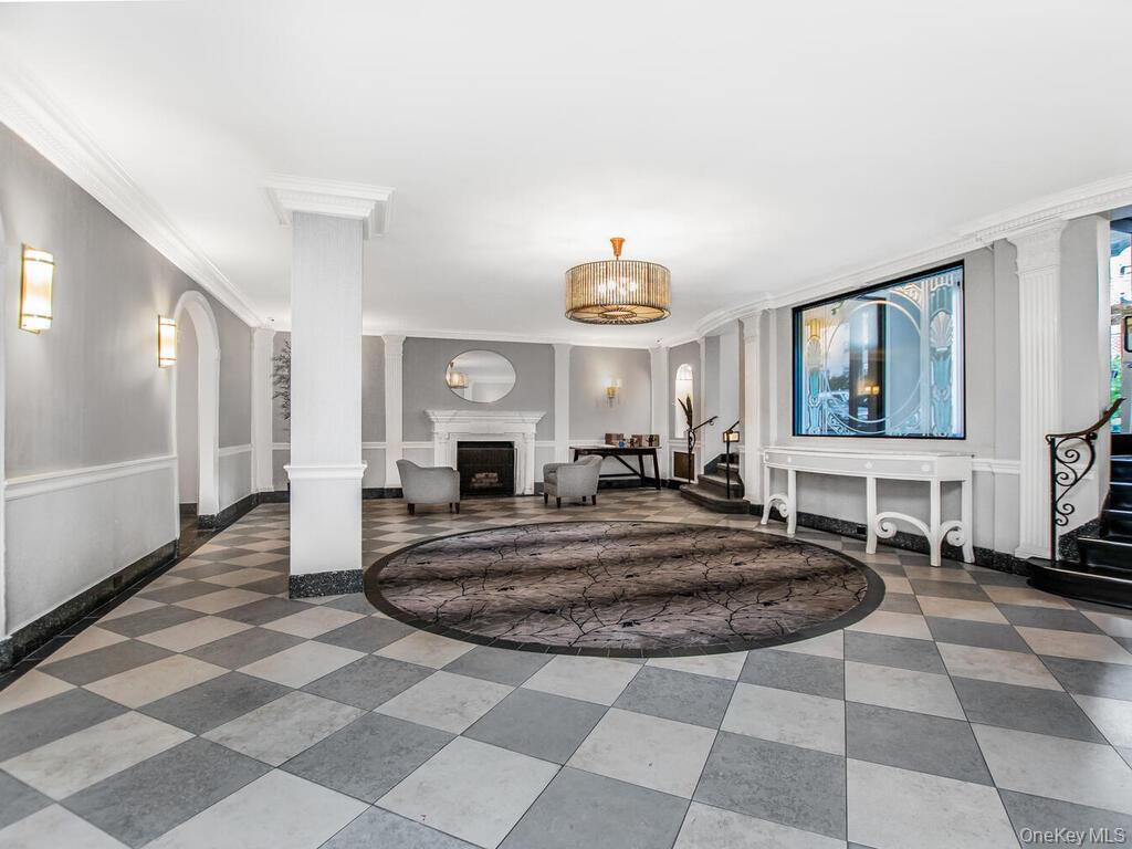 110-55 72nd Road, Unit 601 Queens, NY 11375 - Photo 10 of 14 a view of a livingroom with furniture and window