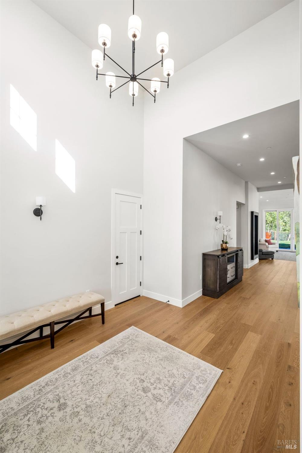 3712 Crown Hill Drive Santa Rosa, CA 95404 - Photo 11 of 71 The entry foyer has a 17 ft ceiling with great lighting and matching wall sconces. Let's head down the hallway to the great room.