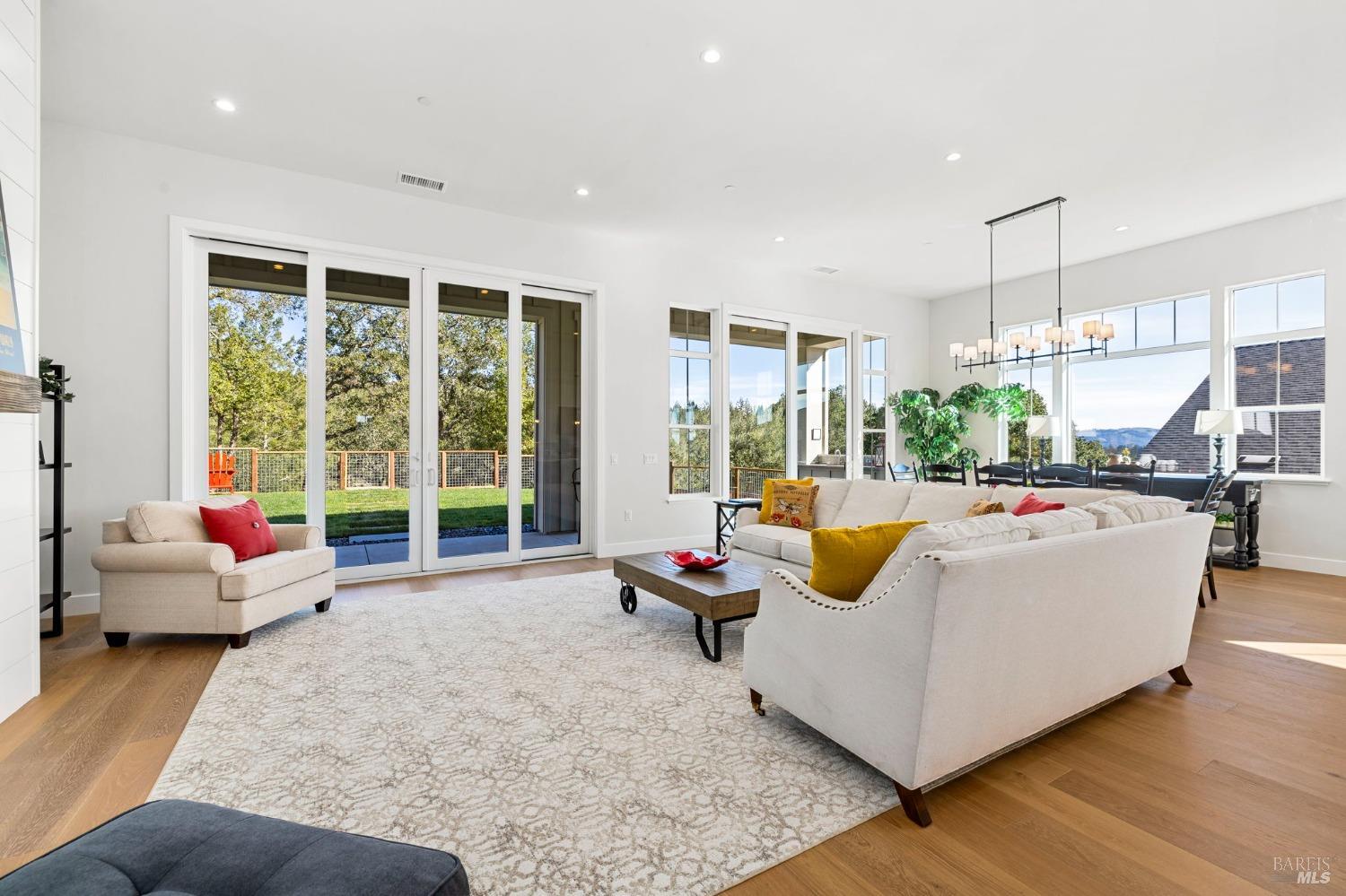 3712 Crown Hill Drive Santa Rosa, CA 95404 - Photo 13 of 71 This great room is open and spacious with plenty of glass doors and windows to bring the light into this home. The glass doors lead out to a covered outdoor living space of 575 sq. ft. +/-.