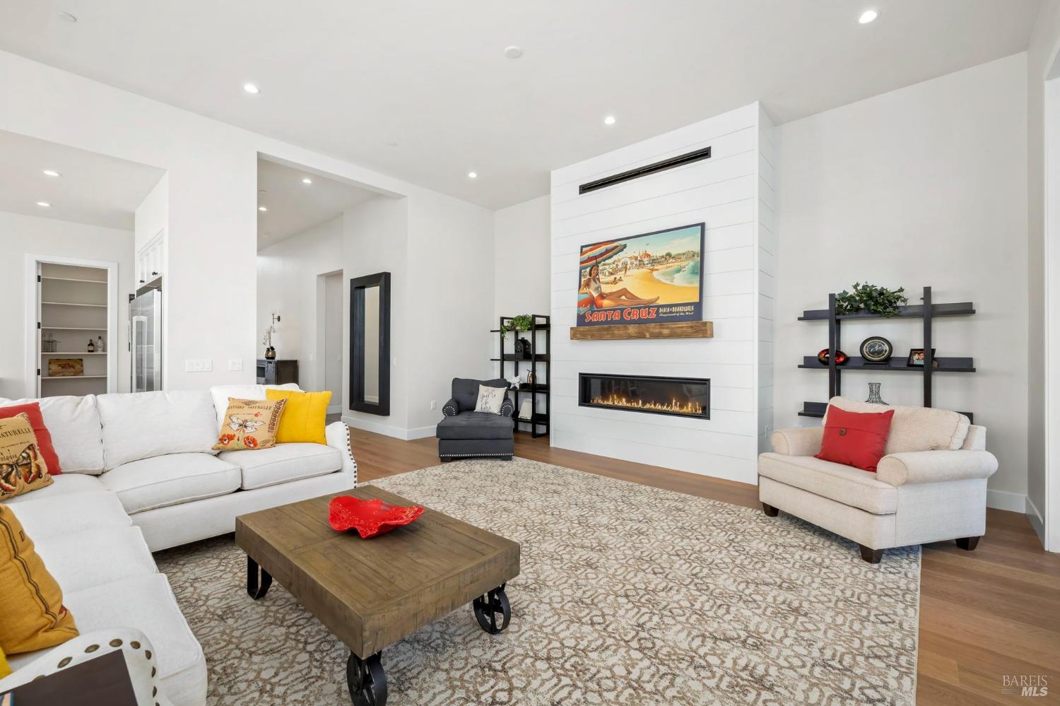 3712 Crown Hill Drive Santa Rosa, CA 95404 - Photo 15 of 71 Looking back towards the fireplace and front hallway entry while standing at the other glass door in the great room.