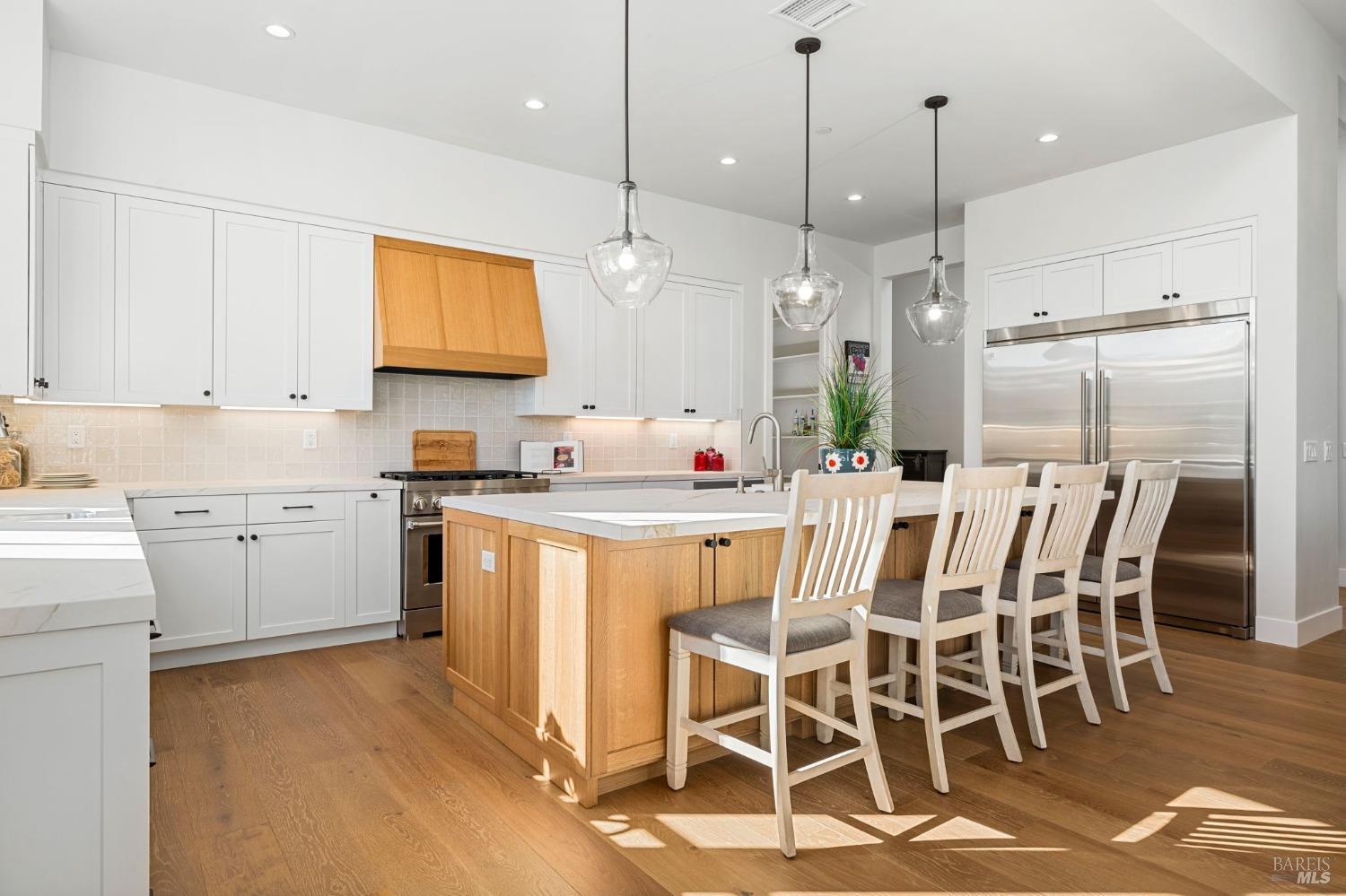 3712 Crown Hill Drive Santa Rosa, CA 95404 - Photo 20 of 71 You will notice the knobs in the island under the countertop. There are 3 large cabinets for additional storage that span the length of the island. Great place to store your Holiday dishes, chaffing pans, etc. for those large family gatherings!