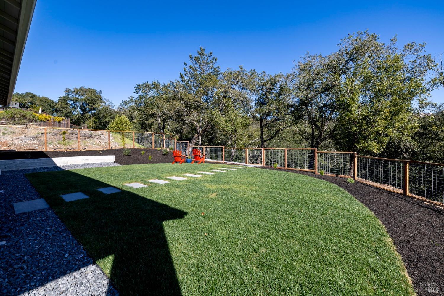 3712 Crown Hill Drive Santa Rosa, CA 95404 - Photo 31 of 71 Here is the view from the outdoor kitchen area looking northeast. There is cross fencing that encloses the level area of this oversized backyard, to keep your children and/or pets in a safe and fun environment. The lot is approx. .38-acre in size and is also has more perimeter fencing below.