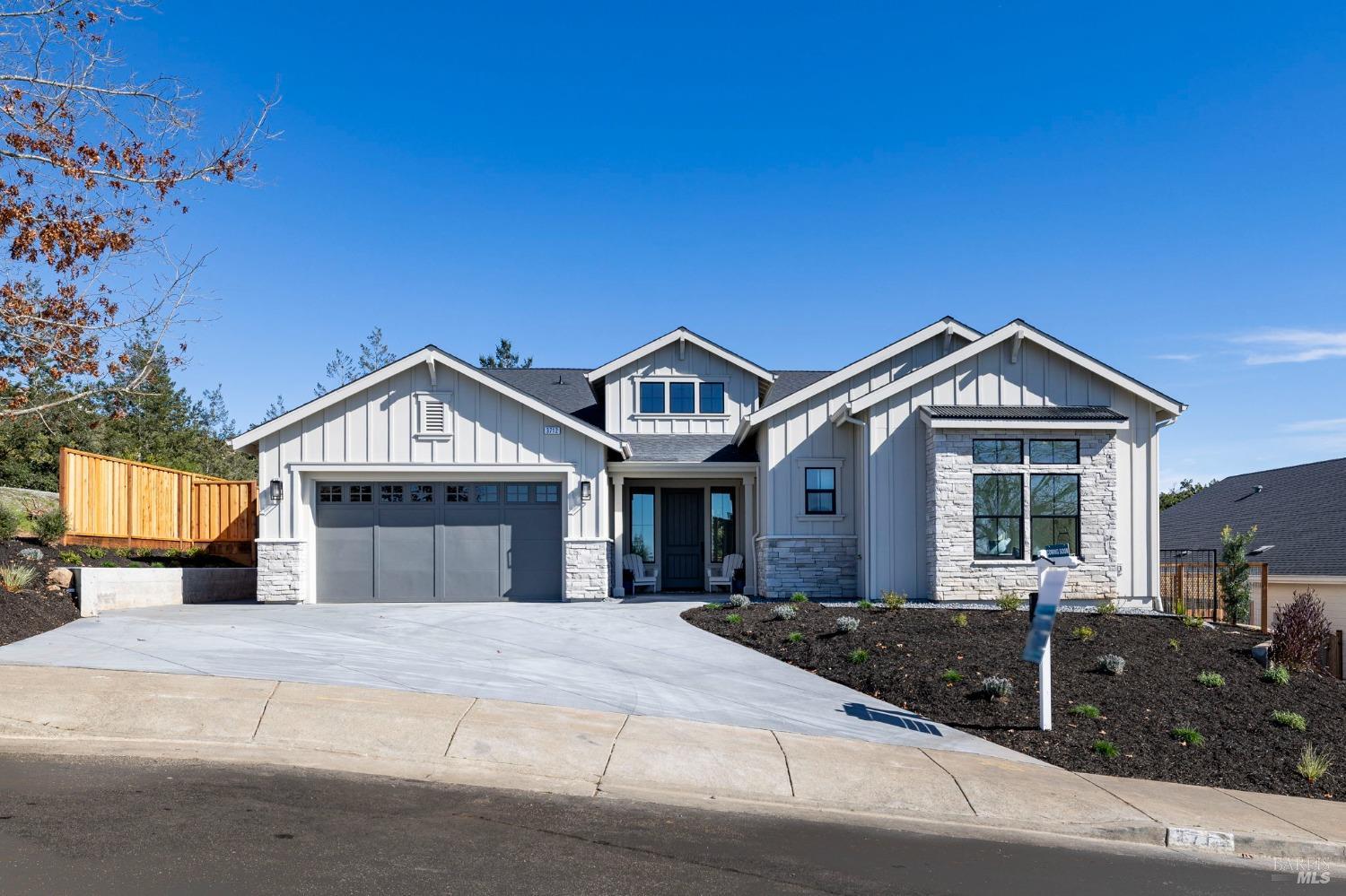 3712 Crown Hill Drive Santa Rosa, CA 95404 - Photo 4 of 71 Look at the extra wide concrete driveway for additional parking and the drought resistant front landscaping. And the attention to detail of the stonework on the front of this home.