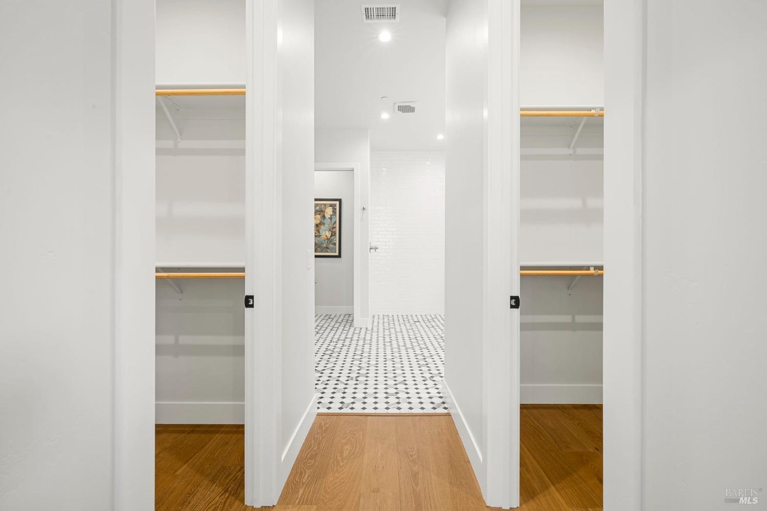 3712 Crown Hill Drive Santa Rosa, CA 95404 - Photo 43 of 71 This hall leads to the primary bathroom. There are large dual Walkin closets on each side of the hall.