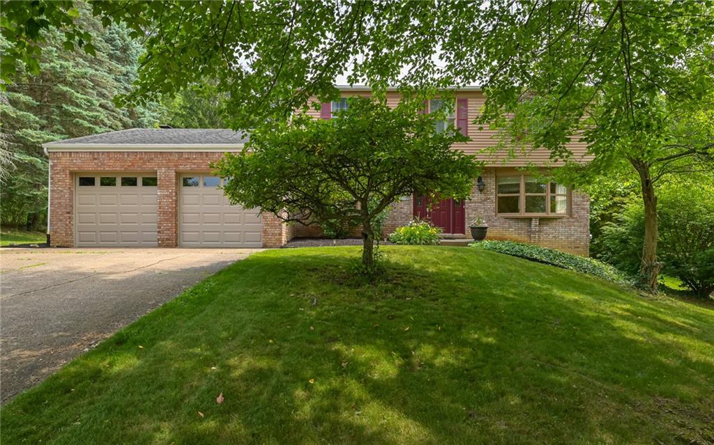 1392 Old Meadow Road Pittsburgh, PA 15241 - Photo 2 of 34 a front view of house with yard and green space