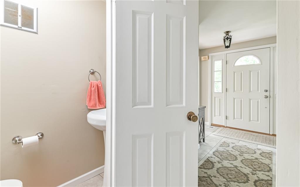 1392 Old Meadow Road Pittsburgh, PA 15241 - Photo 23 of 34 a bathroom with a sink and a mirror