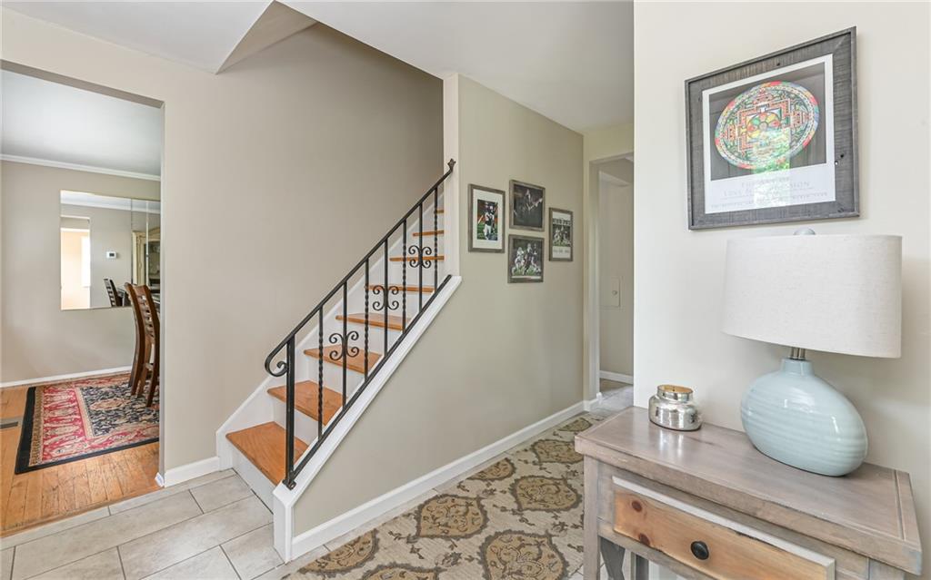 1392 Old Meadow Road Pittsburgh, PA 15241 - Photo 3 of 34 a view of entryway and hall with wooden floor