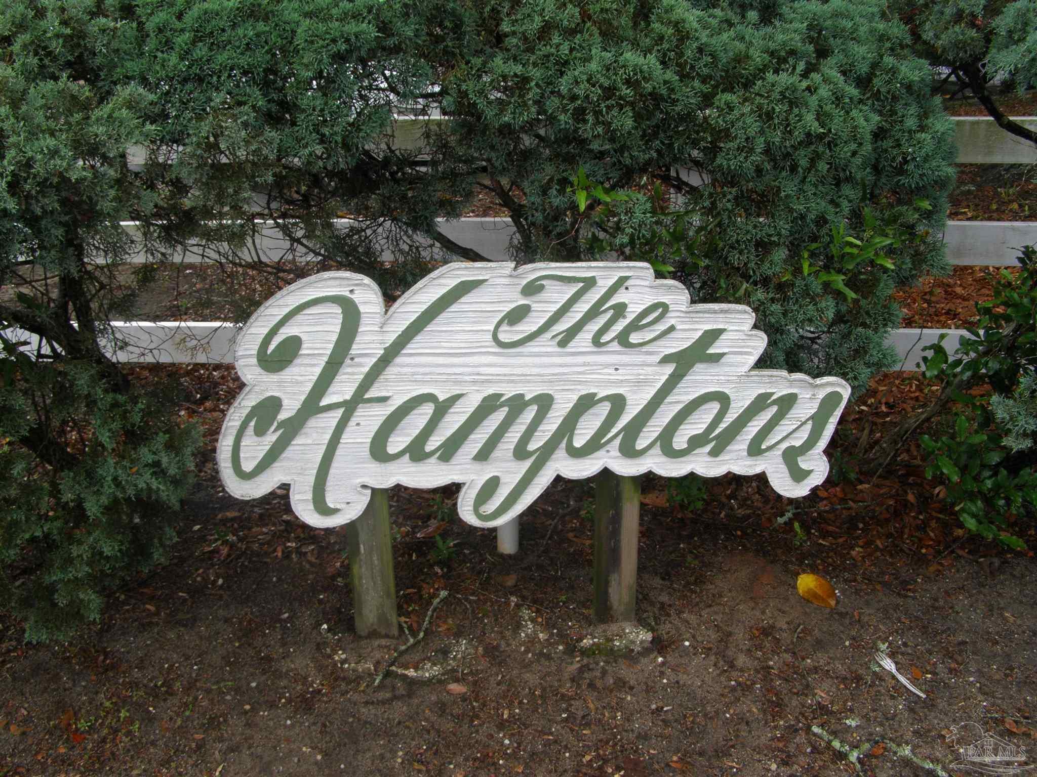 601 East Burgess Road, Unit E3 Pensacola, FL 32504 - Photo 2 of 19 a front view of a house with garden