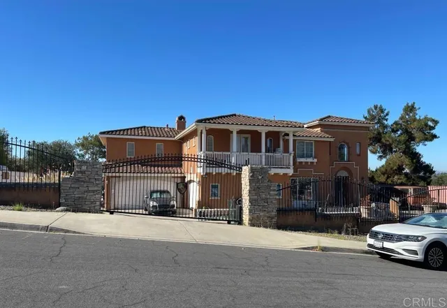 a car parked in front of a house