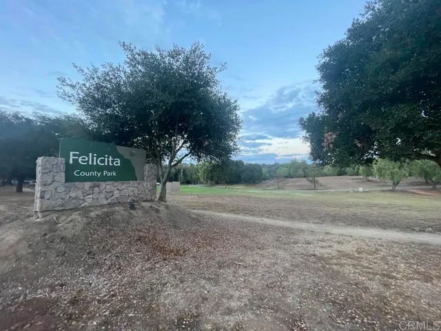 a view of a park with trees