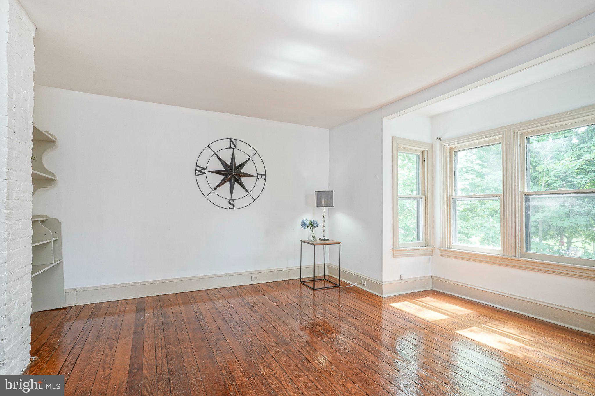 315 Chestnut Street Moorestown, NJ 08057 - Photo 15 of 36 an empty room with wooden floor and windows