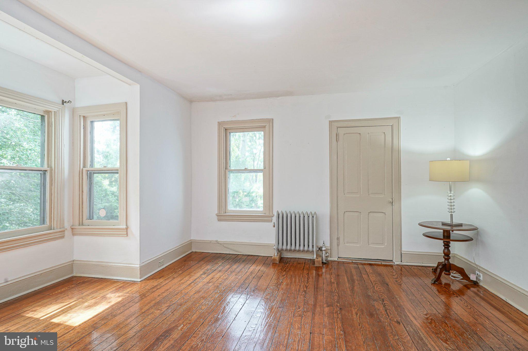 315 Chestnut Street Moorestown, NJ 08057 - Photo 18 of 36 an empty room with wooden floor and windows