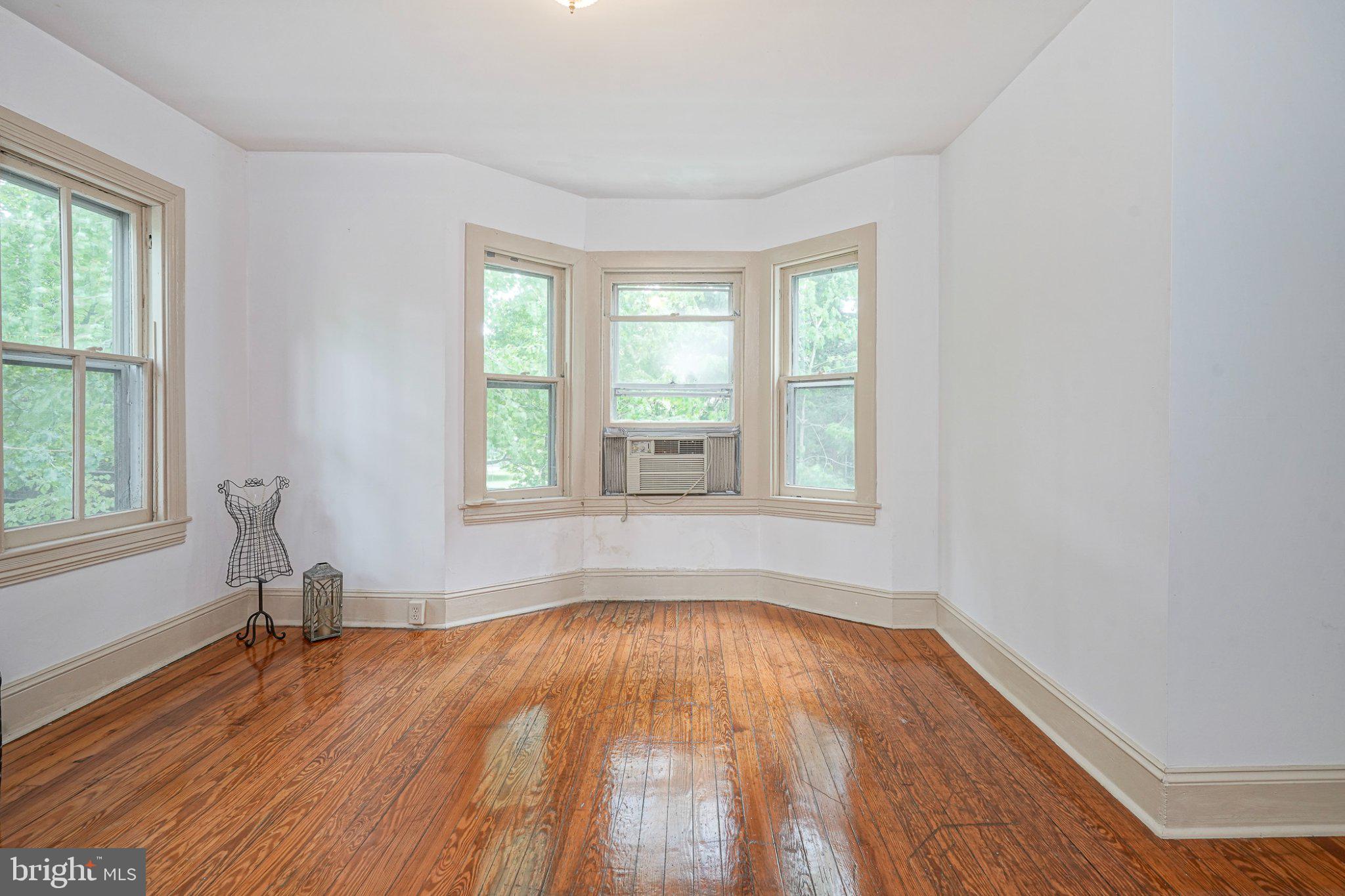 315 Chestnut Street Moorestown, NJ 08057 - Photo 23 of 36 an empty room with wooden floor and windows