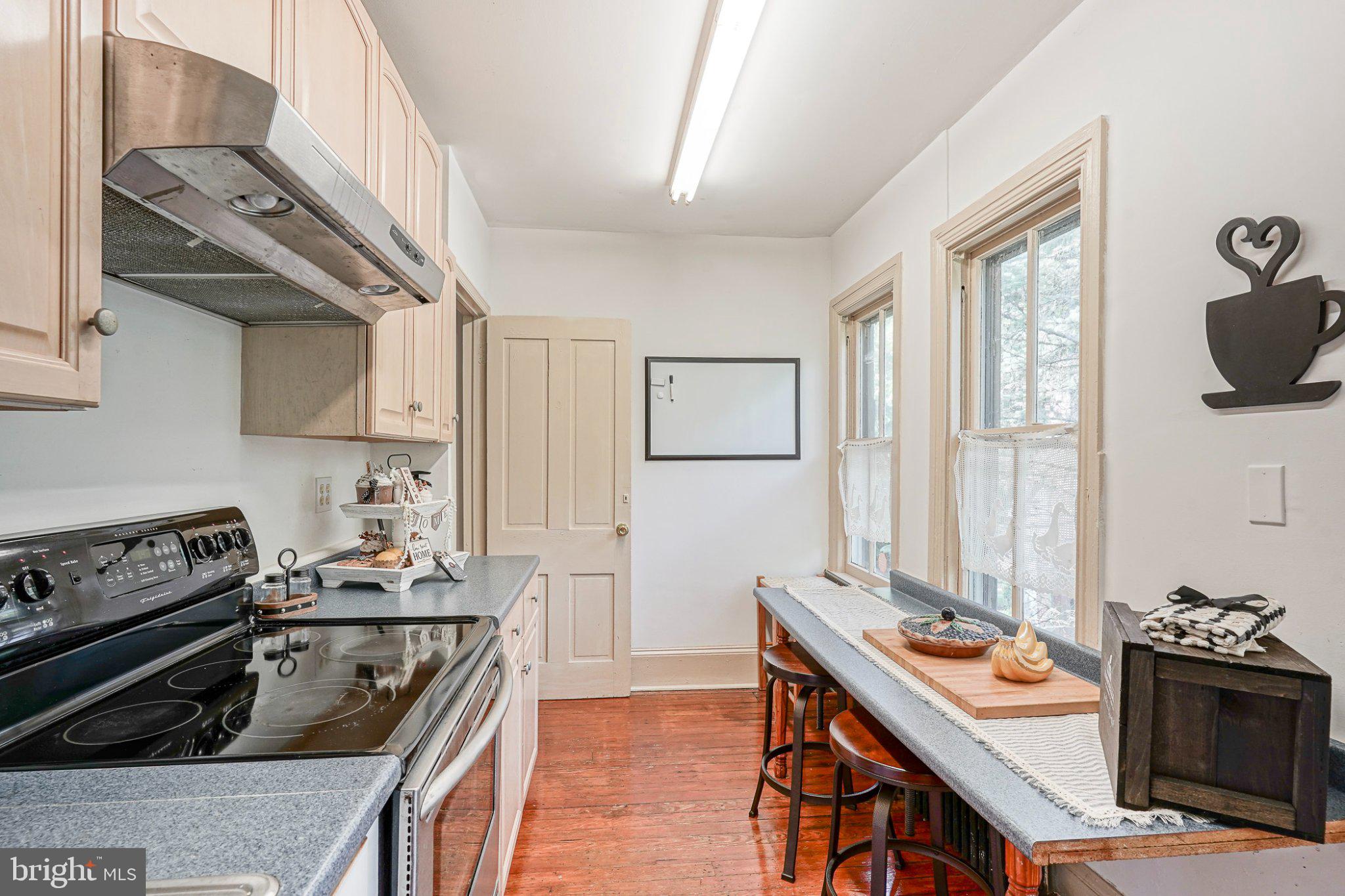 315 Chestnut Street Moorestown, NJ 08057 - Photo 25 of 36 a kitchen with a stove and a refrigerator