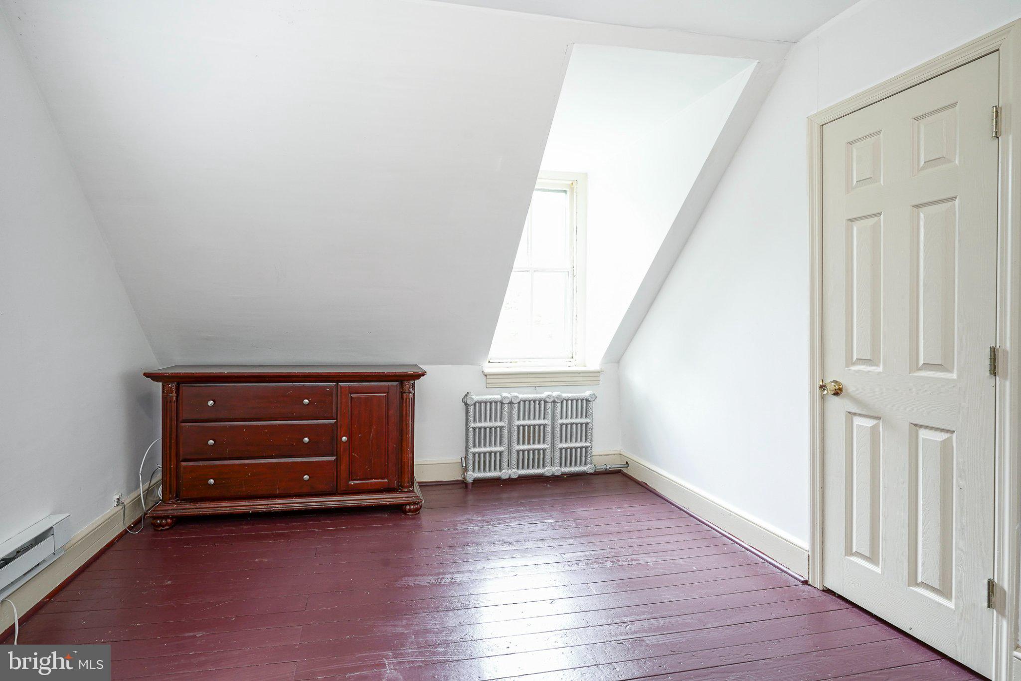 315 Chestnut Street Moorestown, NJ 08057 - Photo 28 of 36 an empty room with wooden floor and windows