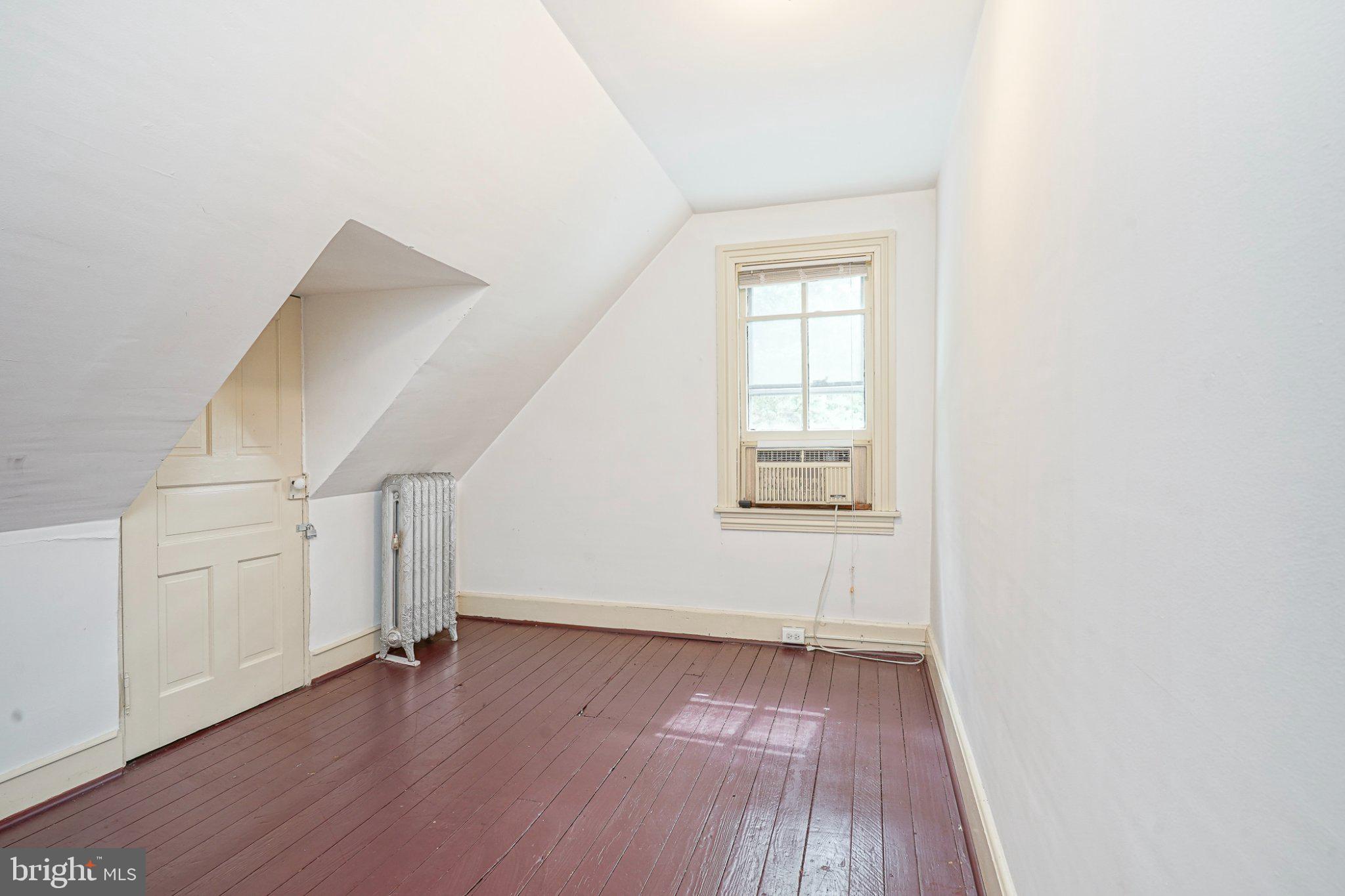 315 Chestnut Street Moorestown, NJ 08057 - Photo 29 of 36 an empty room with wooden floor and windows