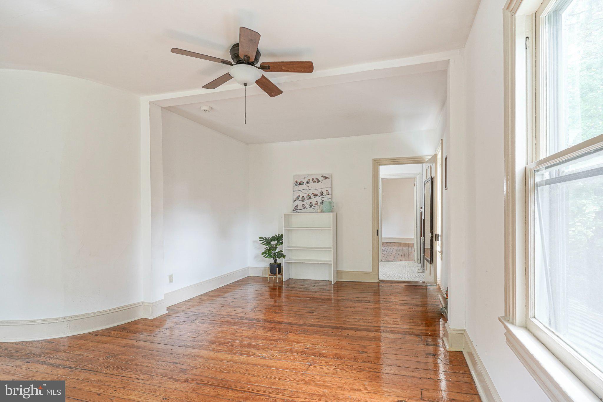 315 Chestnut Street Moorestown, NJ 08057 - Photo 10 of 36 a view of empty room with wooden floor and fan