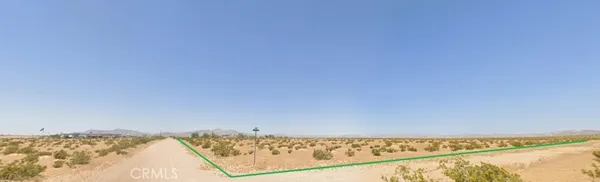 a view of a swimming pool and an outdoor space