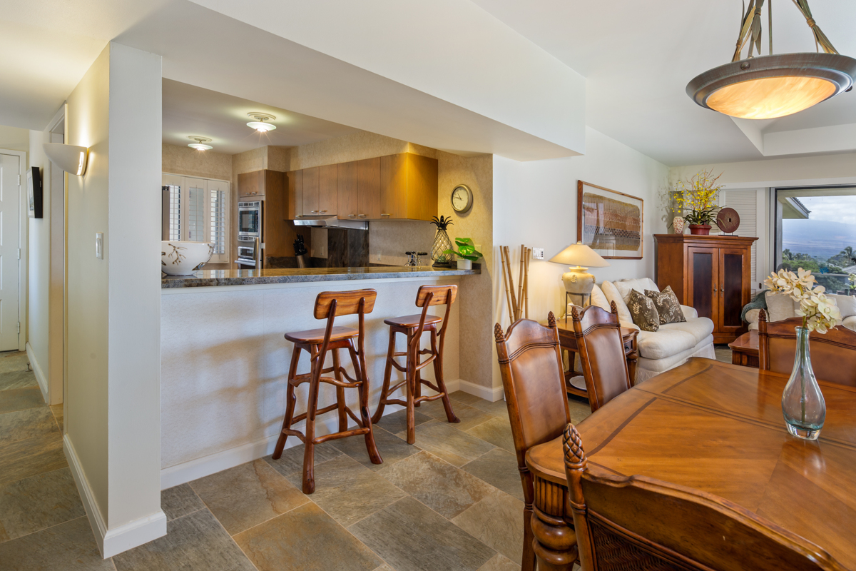 69-1010 Keana Place, Unit E306 Waikoloa, HI 96738 - Photo 1 of 30 a view of a dining room with furniture