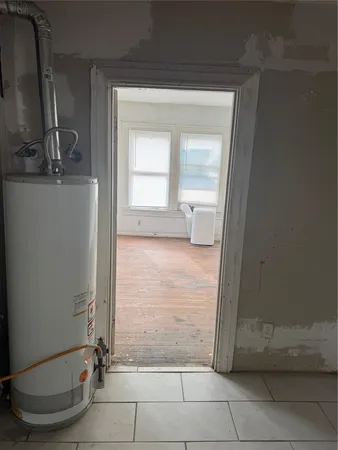 a kitchen with a stove and a sink