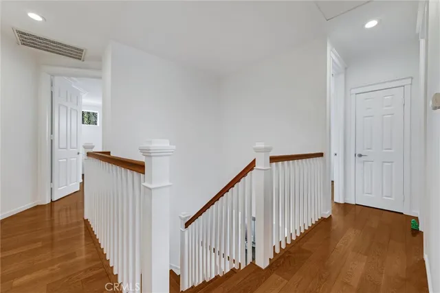 a view of a livingroom with furniture and a flat screen tv