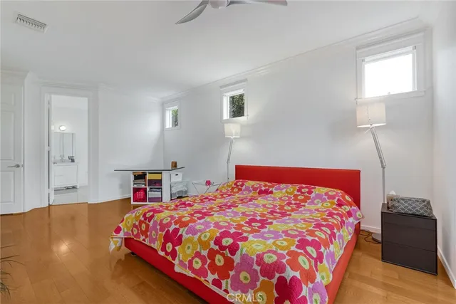 a spacious bathroom with a double vanity sink and a mirror