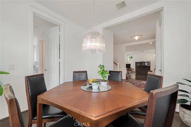 a kitchen with stainless steel appliances granite countertop a stove a refrigerator and a refrigerator