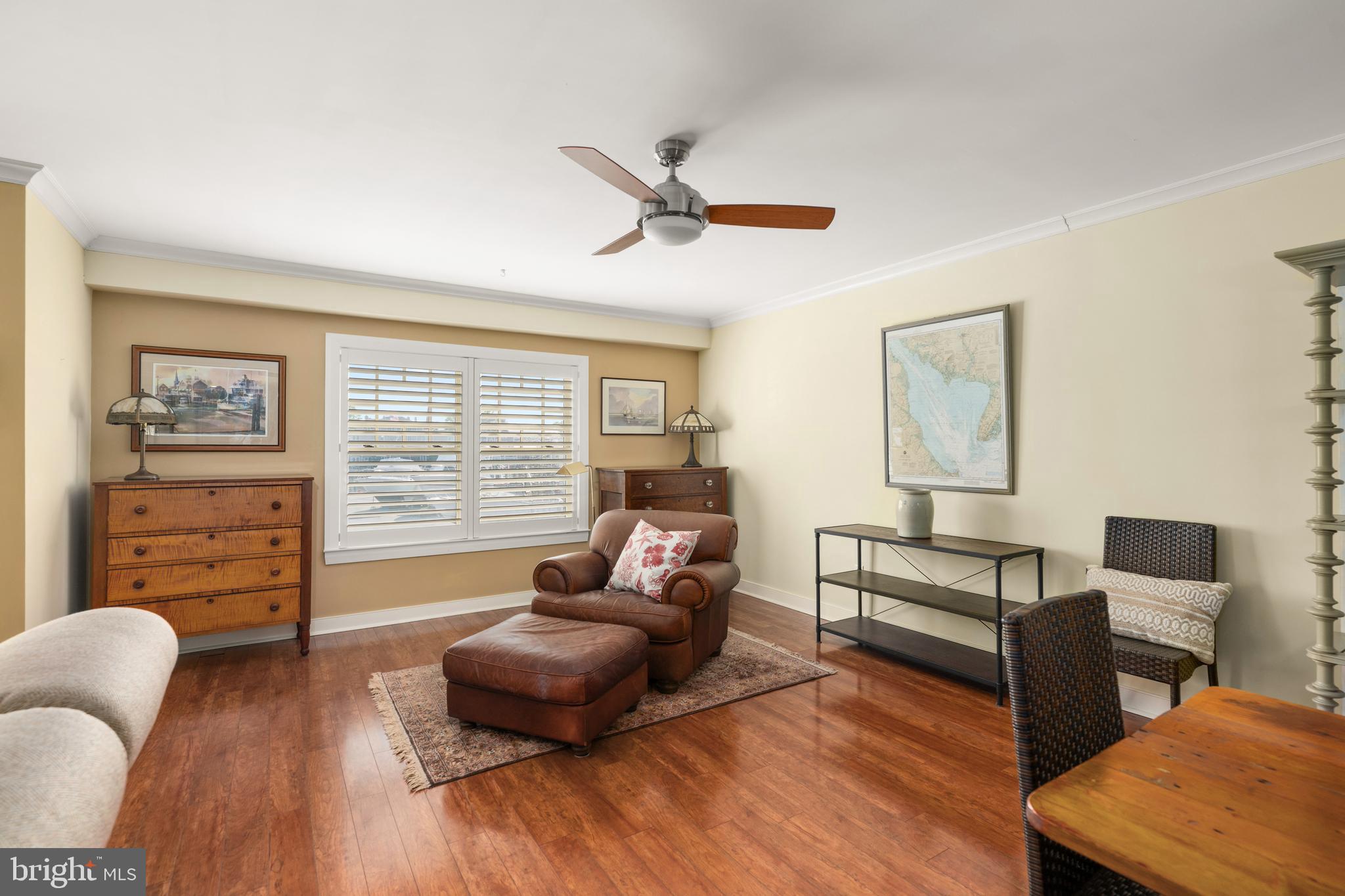 110 Anglers Road, Unit 206 Lewes, DE 19958 - Photo 8 of 40 a living room with furniture and a wooden floor