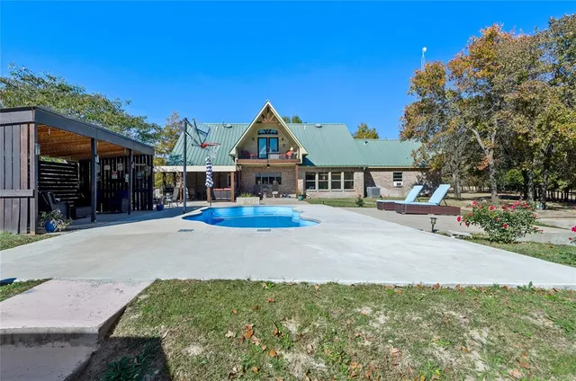 a view of a house with a patio