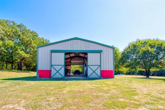 a view of outdoor space with playground and green space