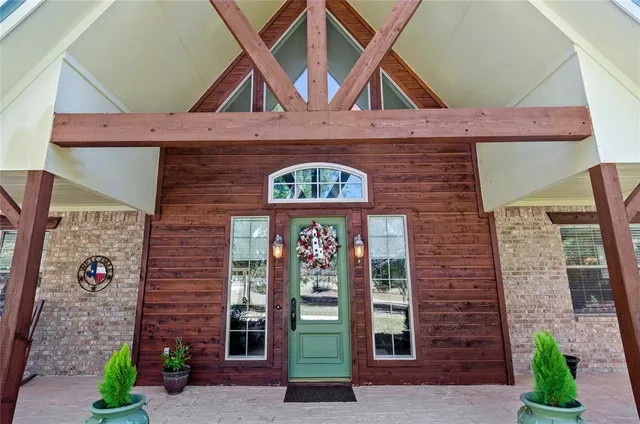 a front view of a building with garden