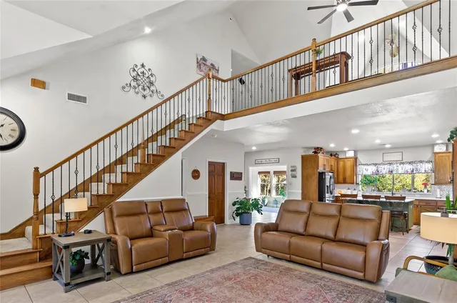 a living room with furniture or stairs and a couch