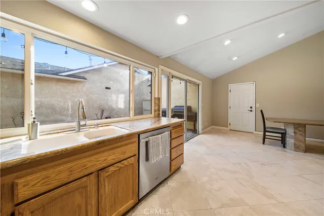 a large bathroom with a large tub and sink