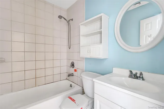 a bathroom with a sink and a bathtub