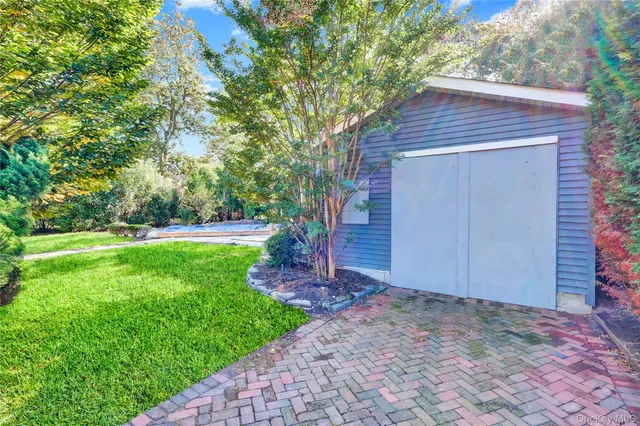 a view of backyard with tree