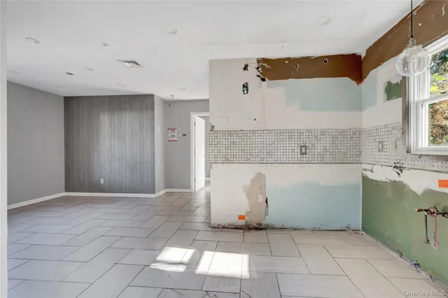 a view of a bathroom with a bathtub