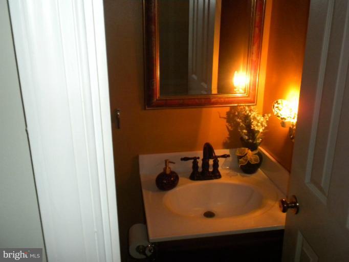 1721 Ball Road Port Republic, MD 20676 - Photo 18 of 25 a bathroom with a sink