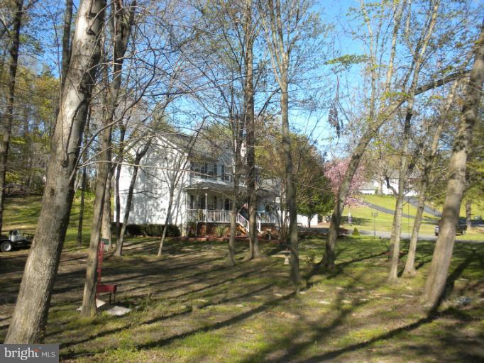 1721 Ball Road Port Republic, MD 20676 - Photo 20 of 25 a view of yard with trees
