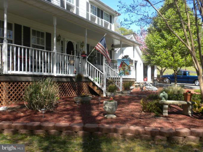 1721 Ball Road Port Republic, MD 20676 - Photo 23 of 25 a view of a house with a yard