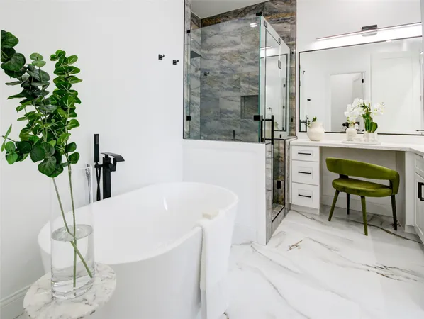 a bathroom with a bathtub a sink and a mirror
